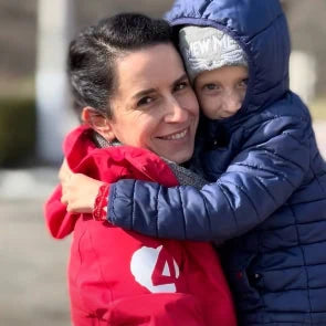 Zoe sharing a hug during Hope4 community work